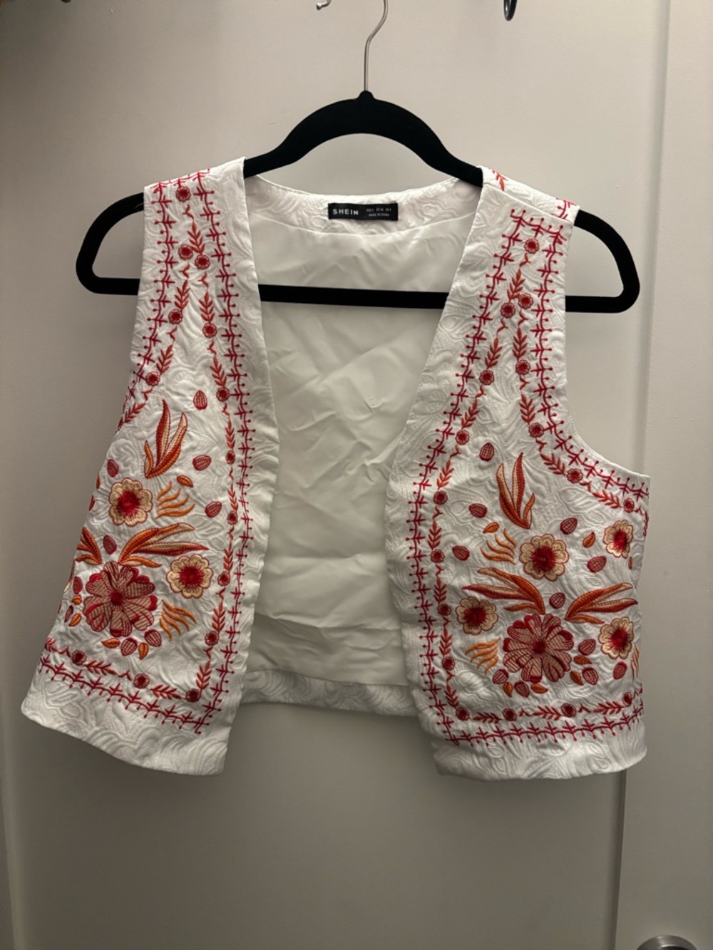 SHEIN White Embroidered Floral Vest with Red & Orange Accents